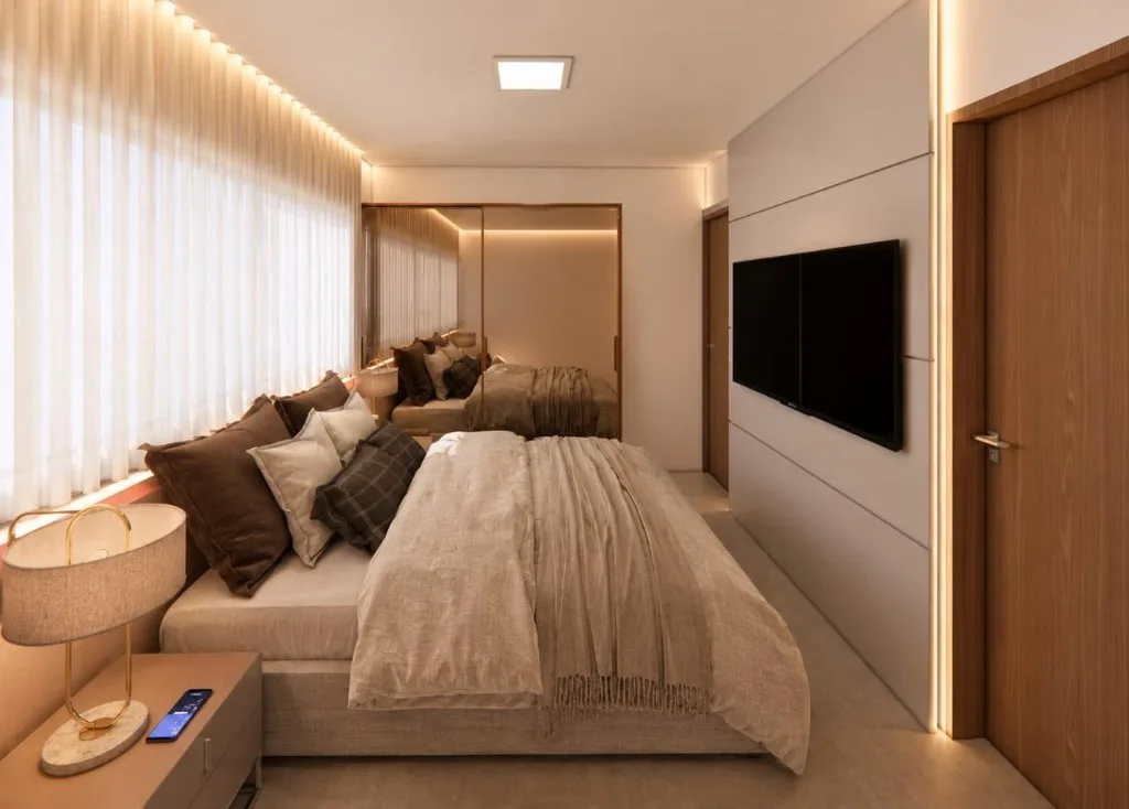 Quarto do apartamento decorado do Wave Jacumã Residence, com cortinas e cabeceira
